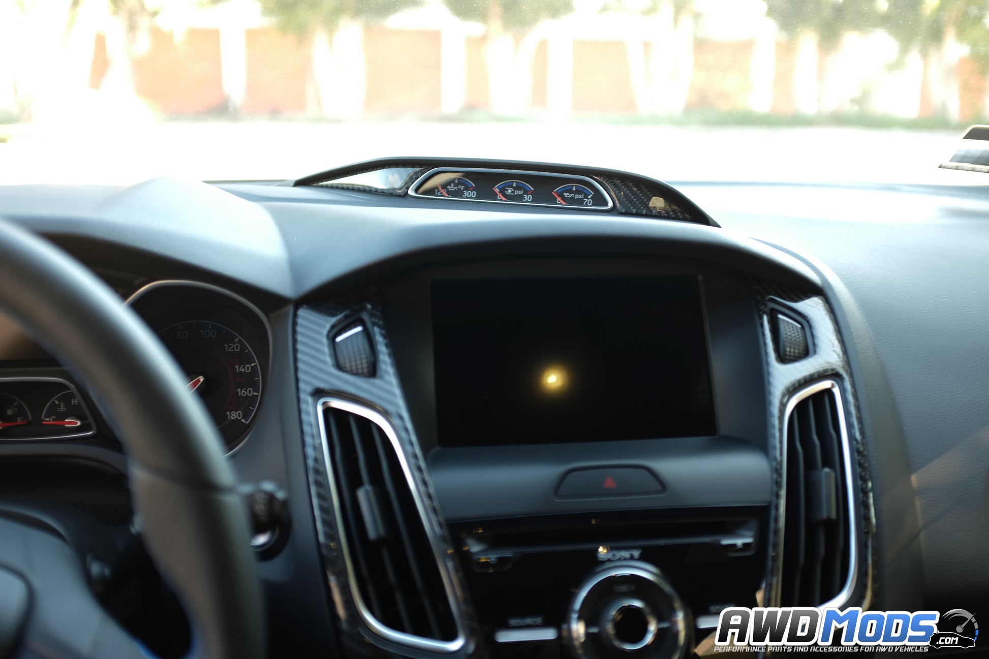 Tufskinz Peel & Stick Carbon Fiber Gauge Cluster Accent Kit for the Ford Focus RS / ST (2 Piece Kit)